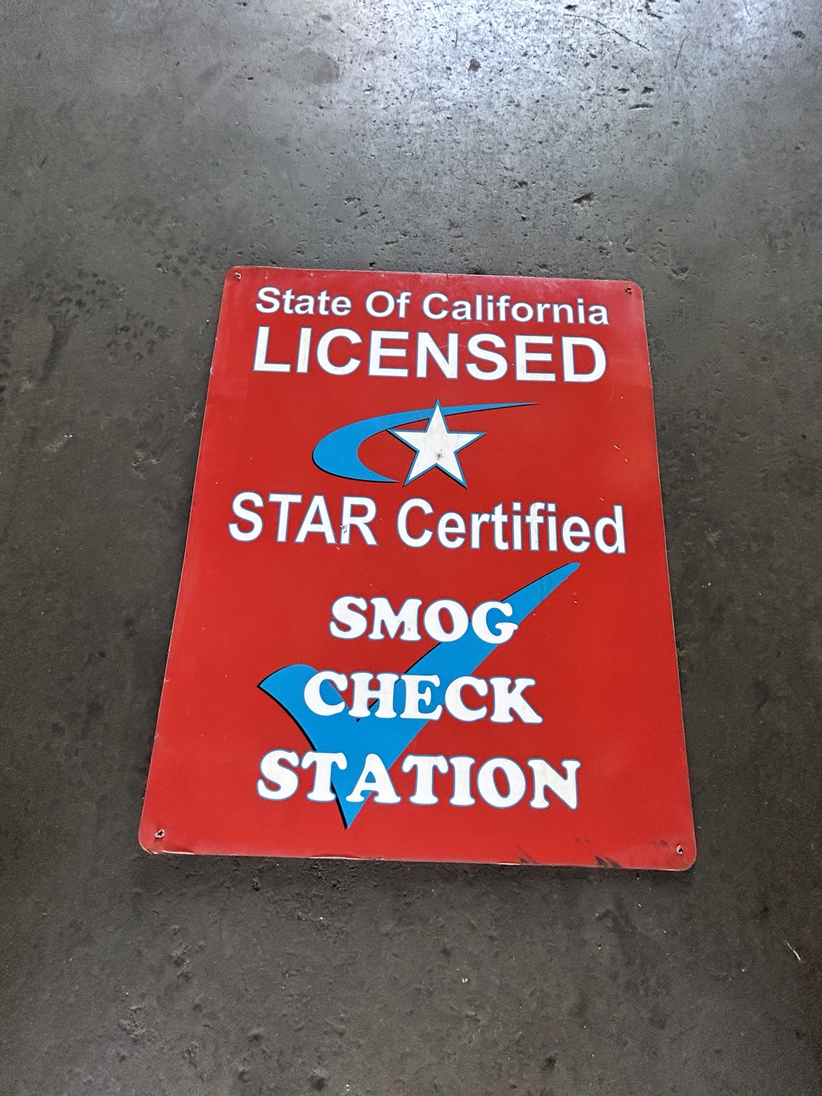 State of California Licensed STAR Certified Smog Check Station sign